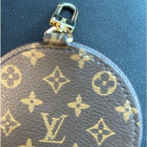 Louis Vuitton coin purse.